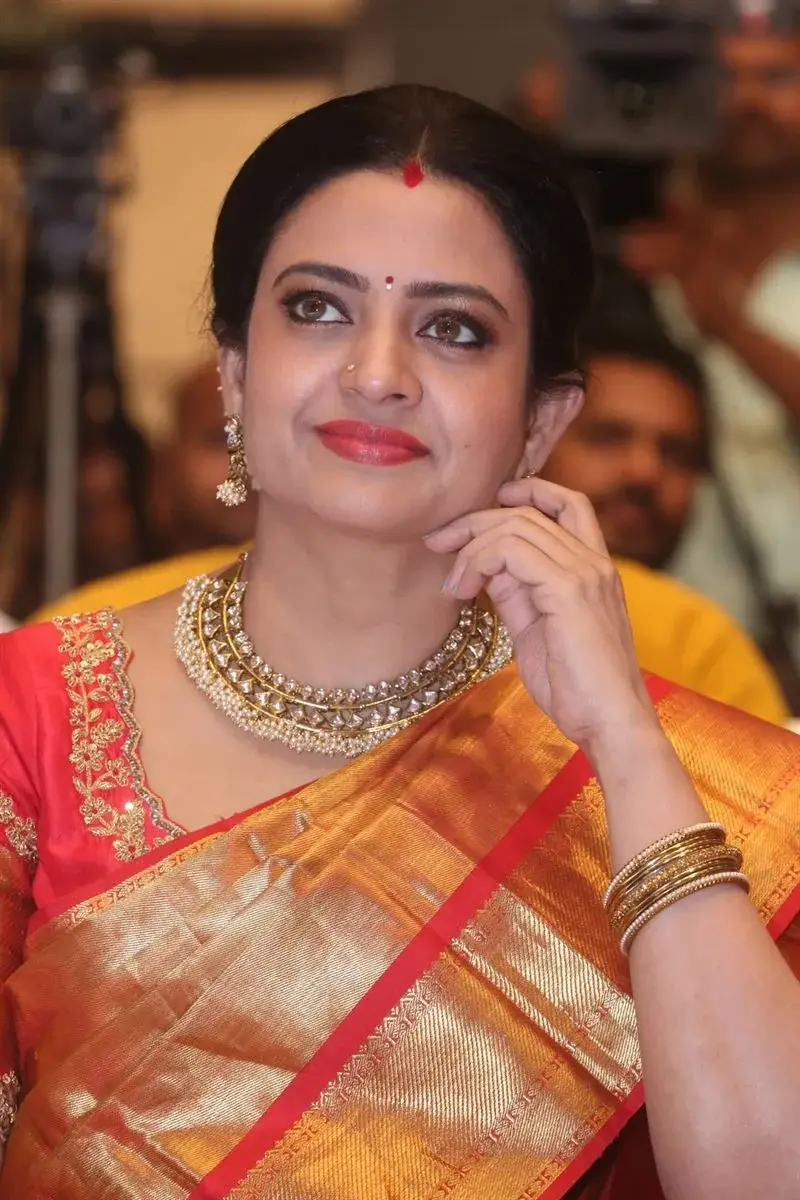 ACTRESS INDRAJA IN ORANGE SAREE AT RAZAKAR MOVIE EVENT 15